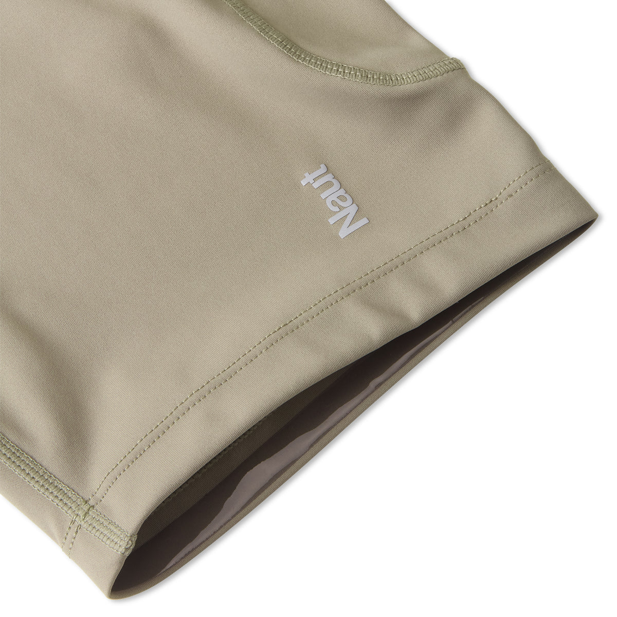 Earth Brown | macro1 | Naut 7-inch compression half tights for men, close-up detail