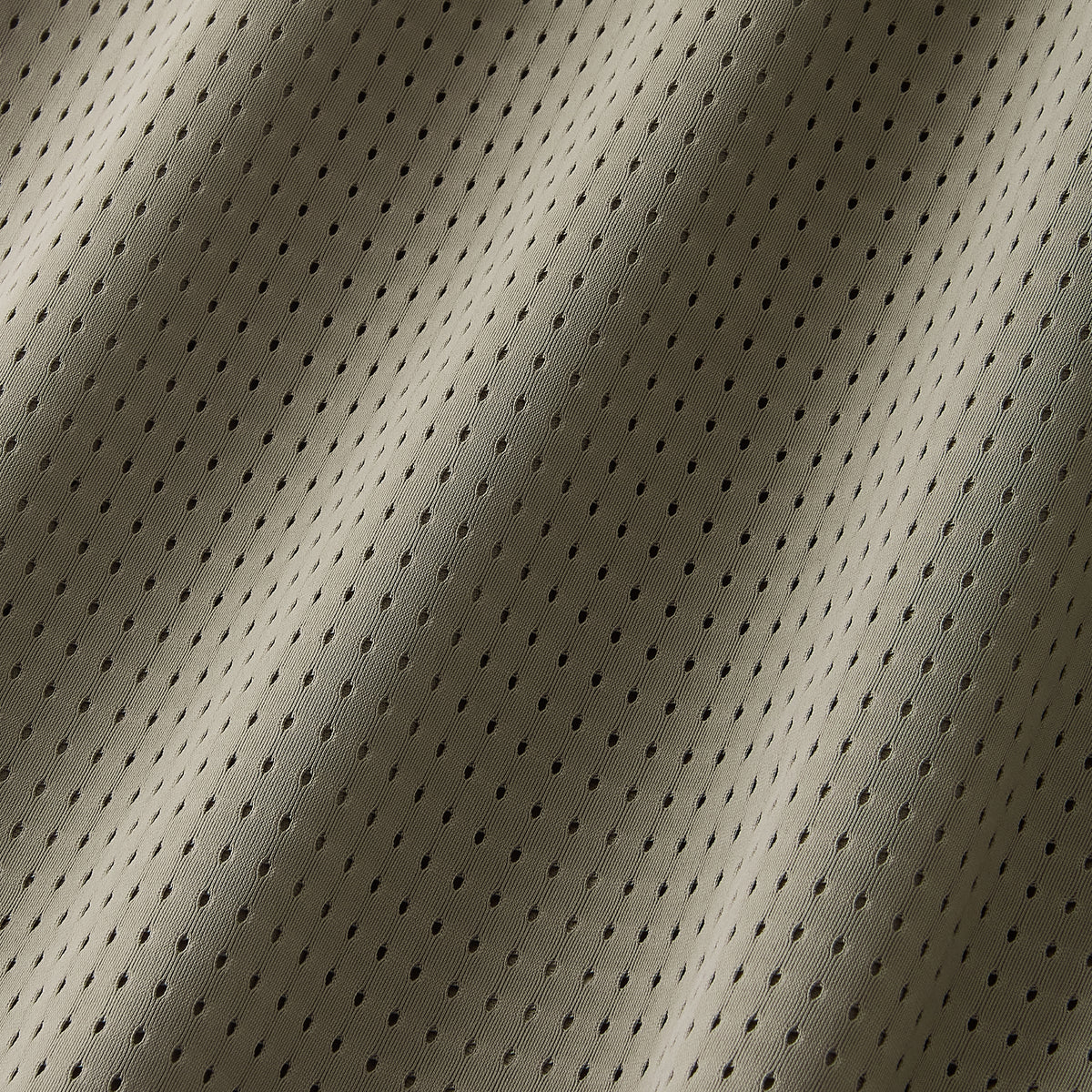 Earth Brown | macro1 | Naut Horat perforated running singlet for men, close-up detail